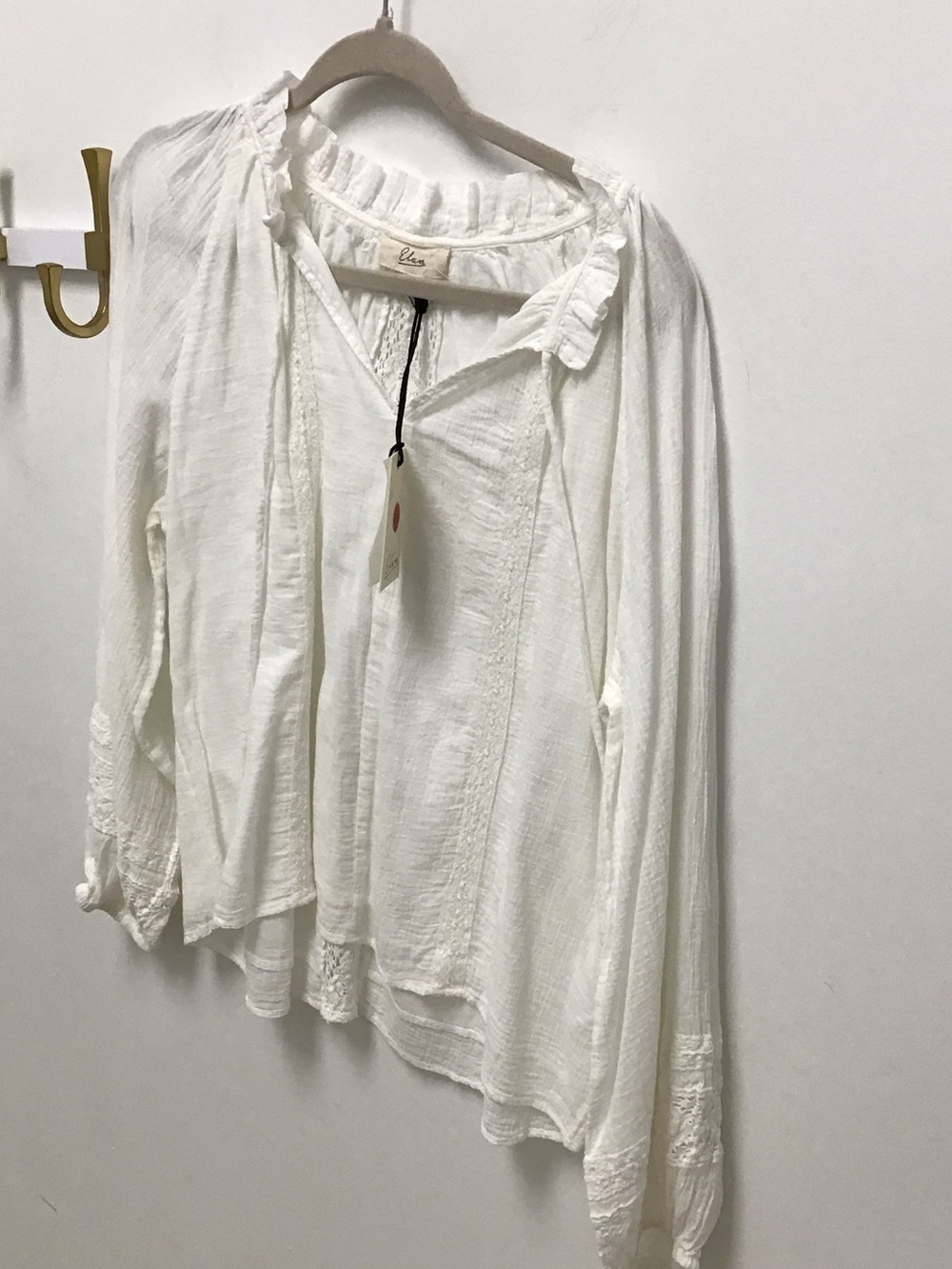 Elan long sleeve white gauze top.